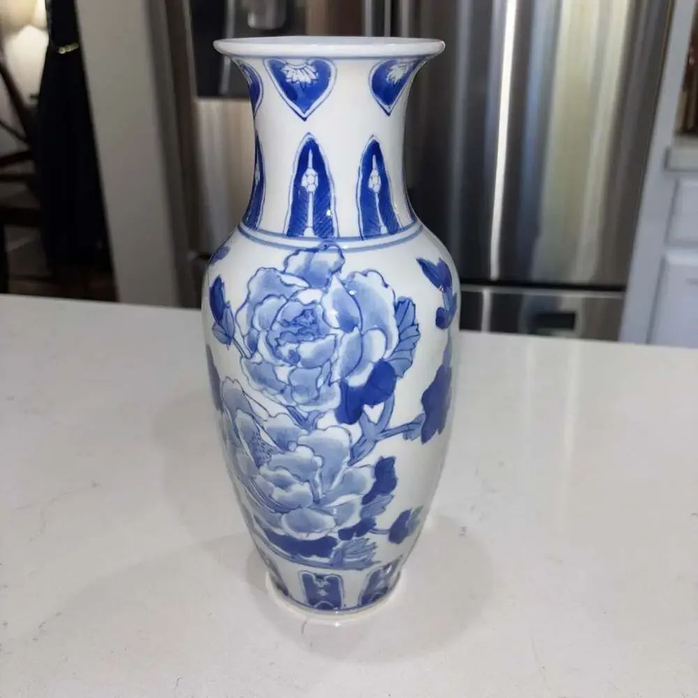 Vintage Blue and White Floral Porcelain Vase with Butterfly Motif